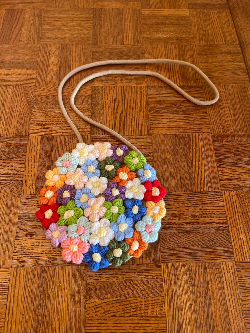 Flower crocheted round Crossbody bag